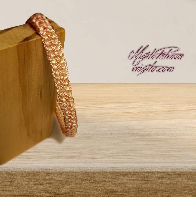 Handwoven pink and ivory bracelet